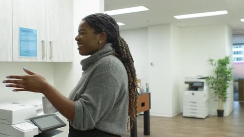 Smiling Businesswoman Talking Drinking Coffee in Office 2529 Years