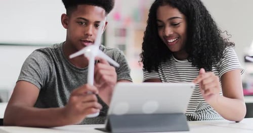 High school students studying renewable energy
