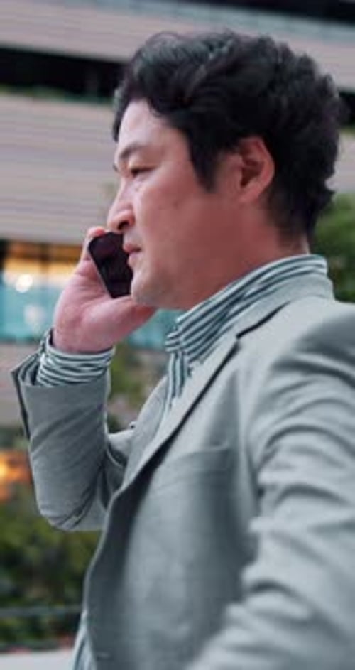 City, business man and walking in street with phone call for meeting appointment