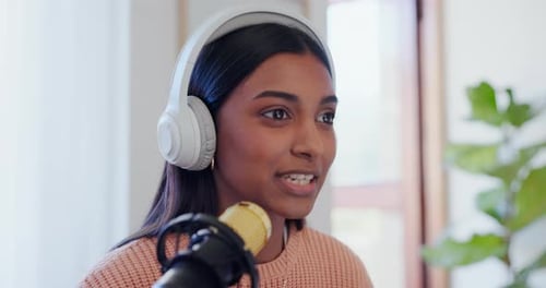 Microphone, headphones and woman on podcast, home and internet recording with connection