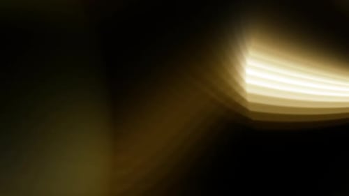 Abstract Golden Light Streaks Flowing Background Loop