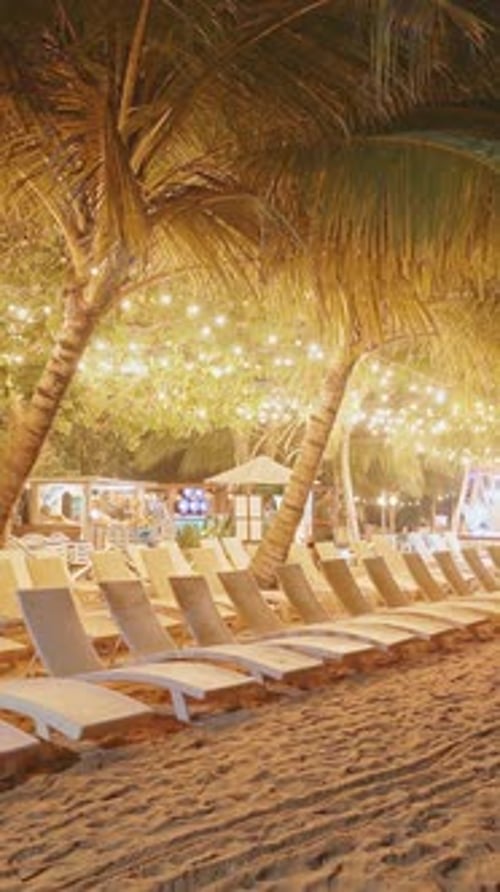 Illuminated Beach Chairs Under String