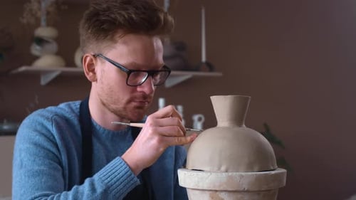 Young Woman in Pottery Studio Using Pottery Wheel Handmade Ceramics Creative