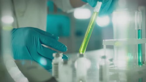 Placing Test Tube in Laboratory Setting