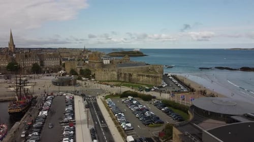 Aerial panoramic view of Saint-Malo port with old ship and medieval fortified castle, France