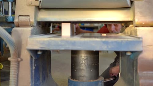 Lumber Being Cut on a Woodworking Machine