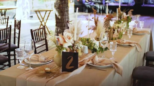 Elegant Wedding Table Setting with Floral Decorations