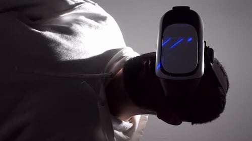 Young Adult Immersed in Virtual Reality Headset