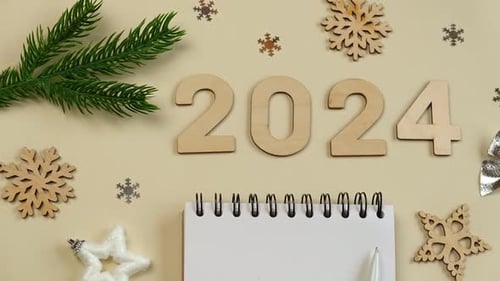 New Year Aims 2024 To Do List Empty Notebook at the Desk with Holiday Decoration Top View Creating