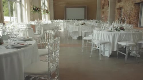 Luxury Wedding Table Setting For Reception Inside The Function Hall. Tilt-up Shot