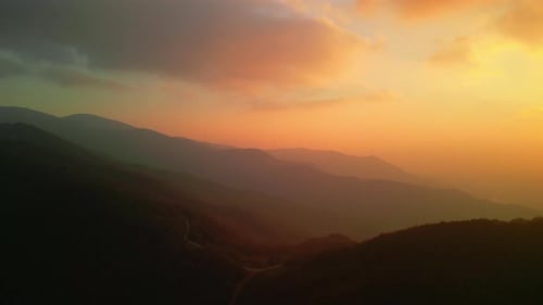 4K Sunset and Mountains Drone Shot