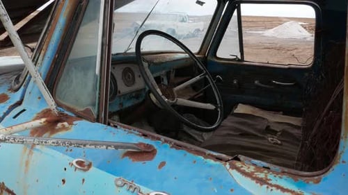 Push in B Roll inside vintage old blue abandoned vehicle
