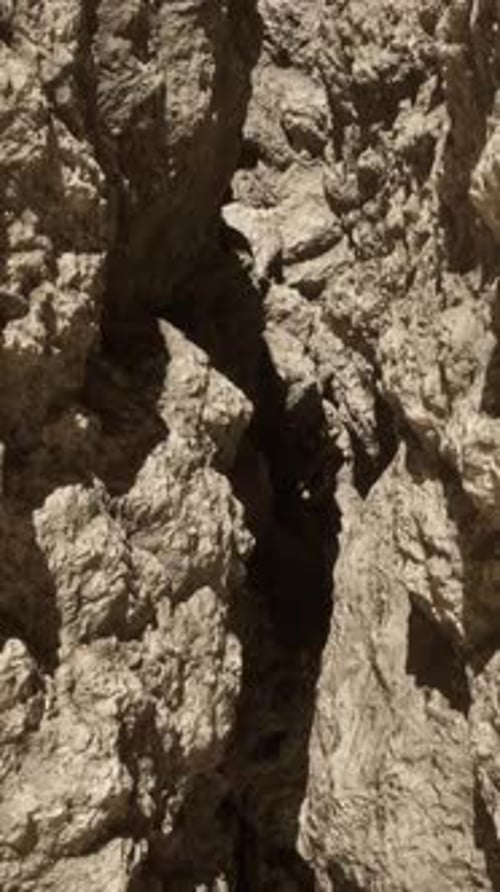 A Very Large Rock Formation with Some Rocks Sticking Out of It