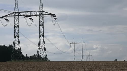 High voltage power lines with blue sky