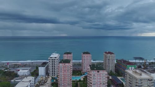 Aerial Video Urban Cityscape in Cloudy Weather Captured From Above with Dense Building Patterns