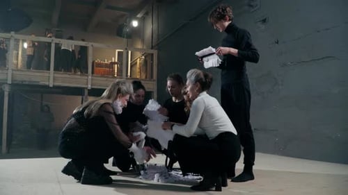 Costume Designers Working on Ruffled Collars