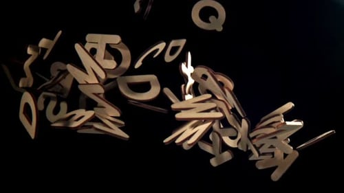The Fall of Wooden English Letters Filmed on a Highspeed Camera at 1000 Fps