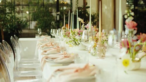 Beautiful Wedding Table Setting with Flowers and Candles
