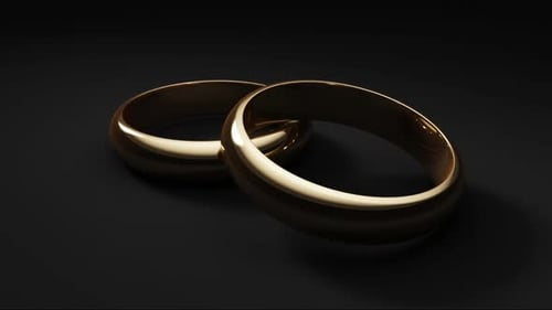 Wedding Rings On Black Loopable background