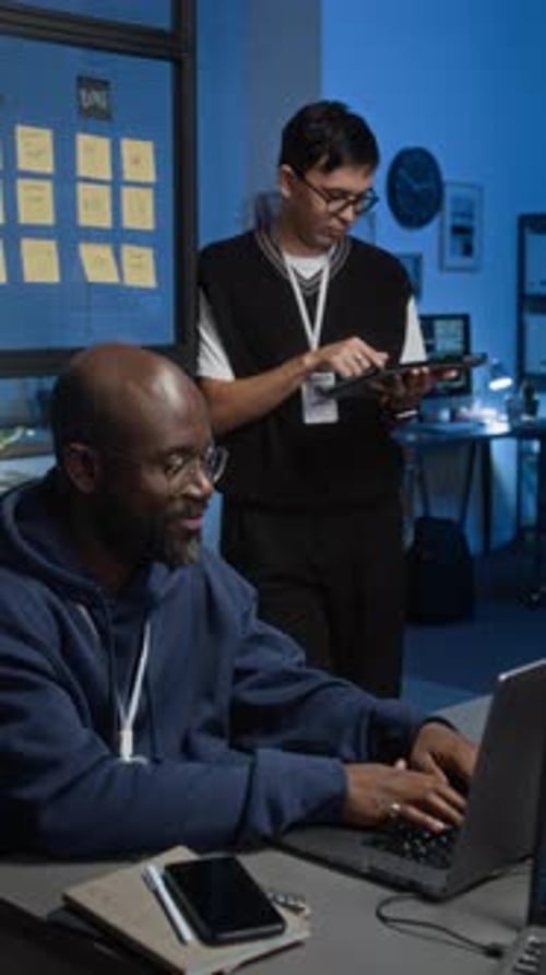 Programmer Writing Code on Laptop, Project Manager Using Digital Tablet