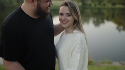 Romantic Couple Enjoying a Serene Moment By the Lake