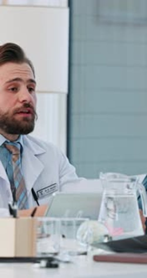 Documents, healthcare or meeting with doctors and hospital administrator in boardroom together