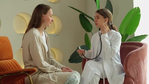 Healthcare Patient and Doctor with a Stethoscope for Examination Care and Wellbeing in the Hospital
