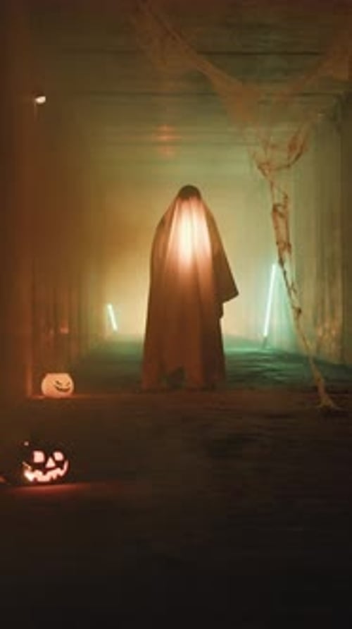 Creepy Ghost in Dark Tunnel with Pumpkins
