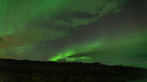 Starry Night Sky With Northern Lights In Iceland - Aurora Borealis - time lapse