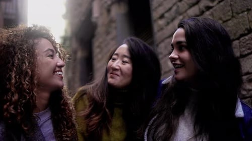 Happy multiethnic people having fun walking by the city - Multiracial women friends lifestyle