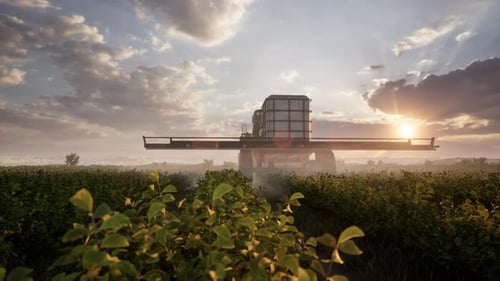 Farming Tractor Plowing And Spraying On Field