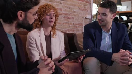 Business Meeting with Tablet in Modern Office