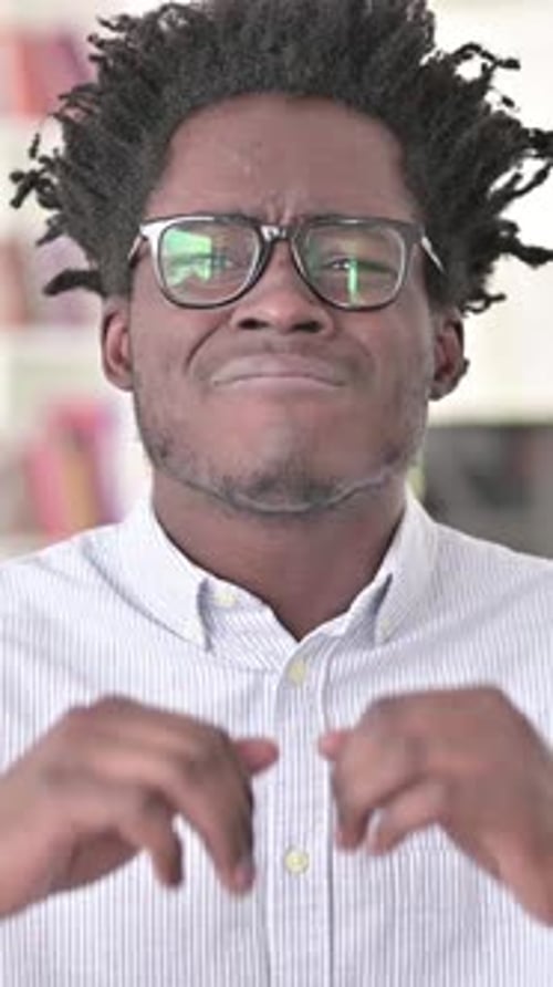 Upset Man Gesturing and Speaking in Portrait Video