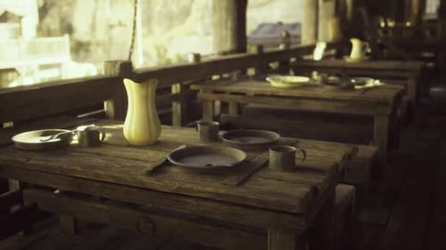 Atmosphere of Tension and Anticipation Fills Weathered Western Saloon Interior