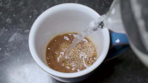 Hot Water Poured Into Instant Coffee Mug
