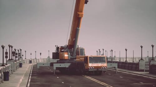 Gran grúa automática en el puente en construcción