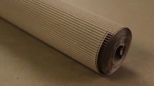 Corrugated cardboard on papercraft background