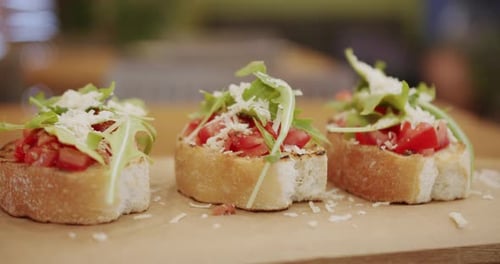 Delicious Bruschetta Sourdough Toast with Cherry Tomatoes Cheese and Arugula
