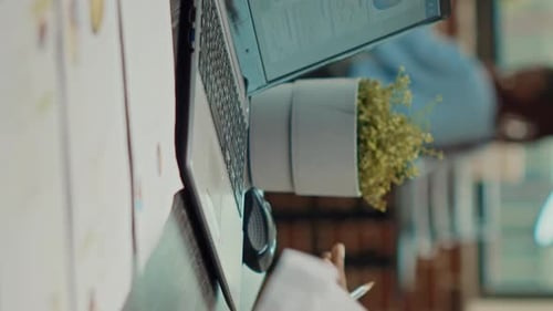 Vertical Video Corporate Assistant Taking Notes