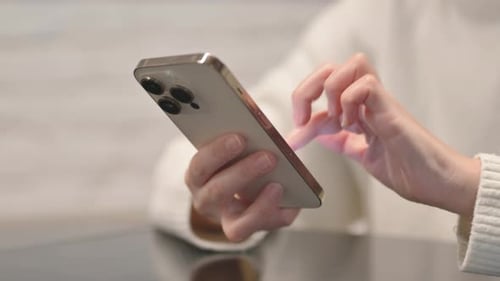 Close up of Woman Browsing Internet on Phone