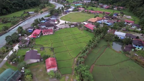 Aerial drone of a village in Kota Belud Sabah Malaysia track in shot