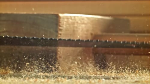 A Hand Saw Falls on the Carpenter's Worktable Filmed on a Highspeed Camera at 1000 Fps