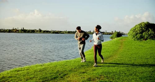 Fitness, running and couple with exercise at lake for marathon, race performance and pace training
