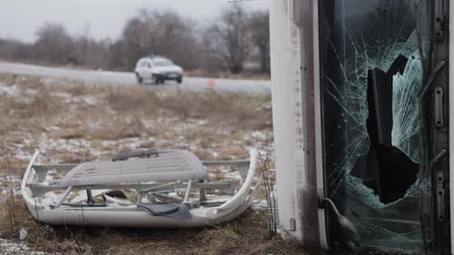 Overturned Car After Accident on Rural Road