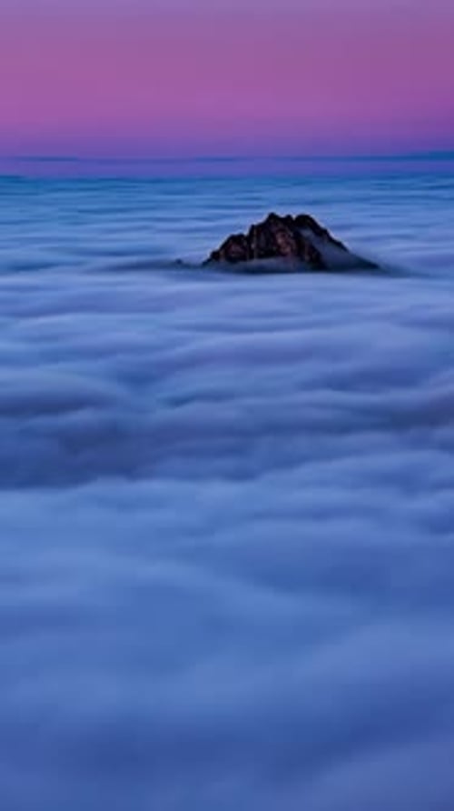 Epic View above Colorful Misty Clouds in Alps Mountains Nature in Cold Evening Vertical Time Lapse
