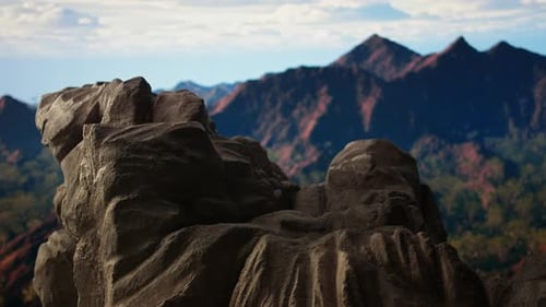 Remote Mountain Wilderness with Rocky Cliffs and Sweeping Vistas