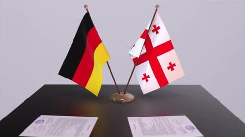 German and Georgian Flags on a Table
