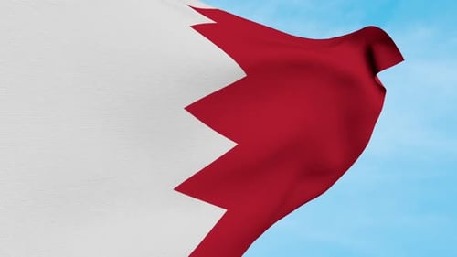 Realistic Waving Flag of Bahrain Against Blue Sky