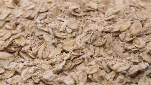 Pouring Oat Grains Close Up