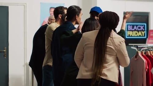 Argument Between Shoppers in Clothing Store During Black Friday